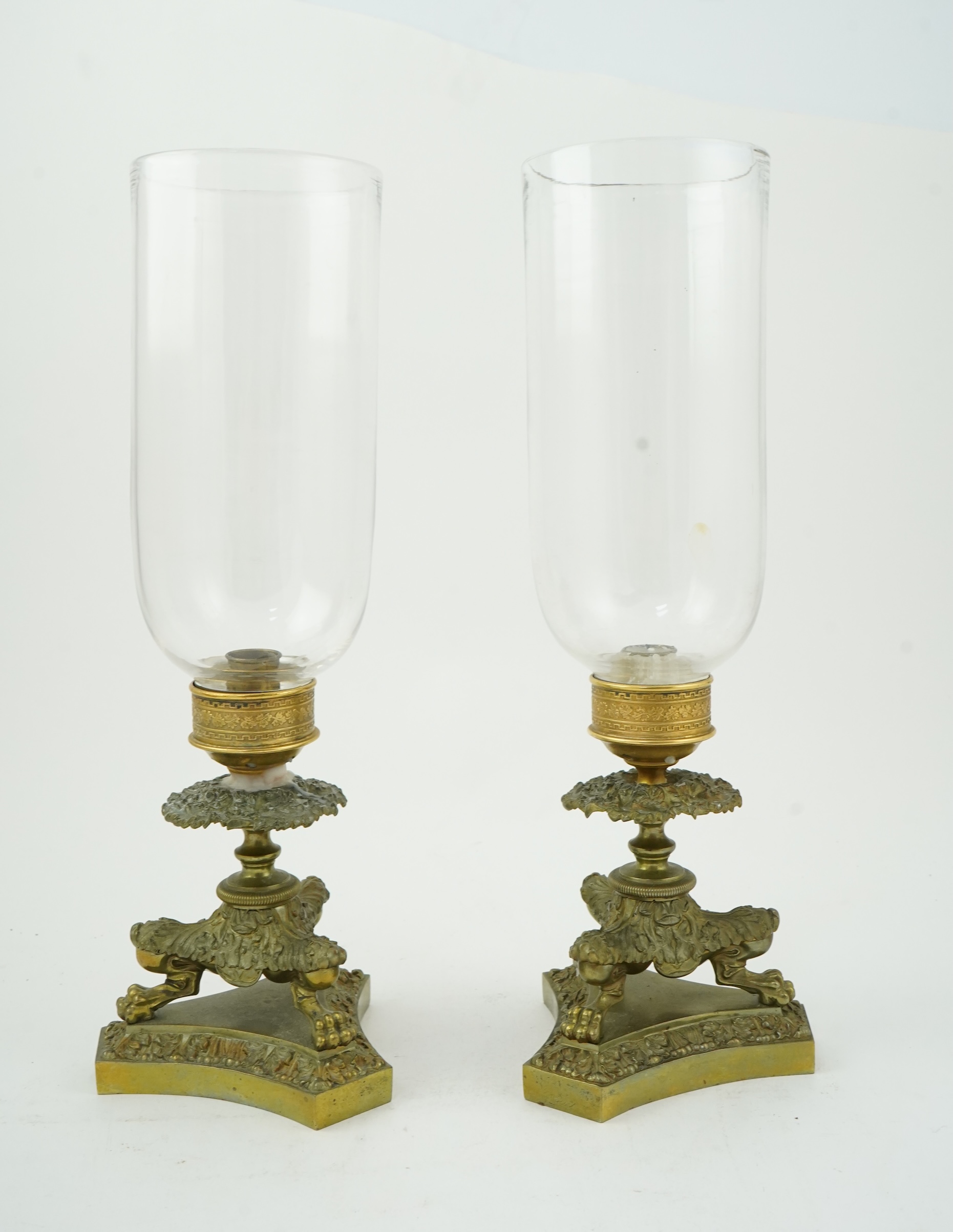 A pair of Empire style ormolu storm lanterns, 19th century
